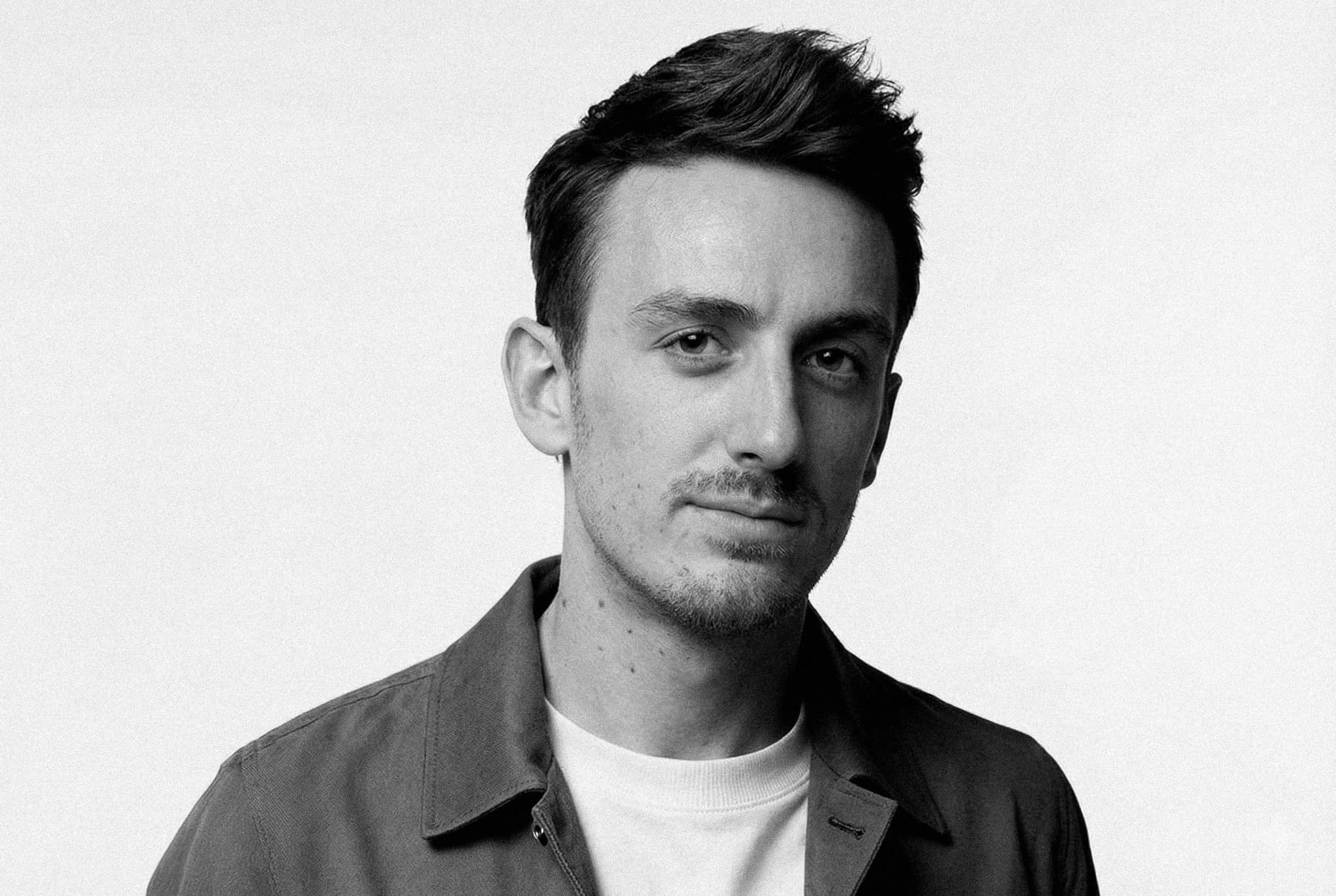 Ivo Adelaar, a black and white portrait against a plain backdrop