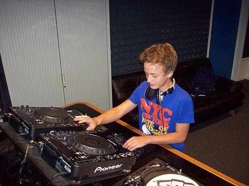 A young Ivo Adelaar at the Pioneer decks in the V-Radio studio